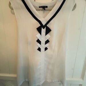 Chic White and Black Blouse with Elegant Design